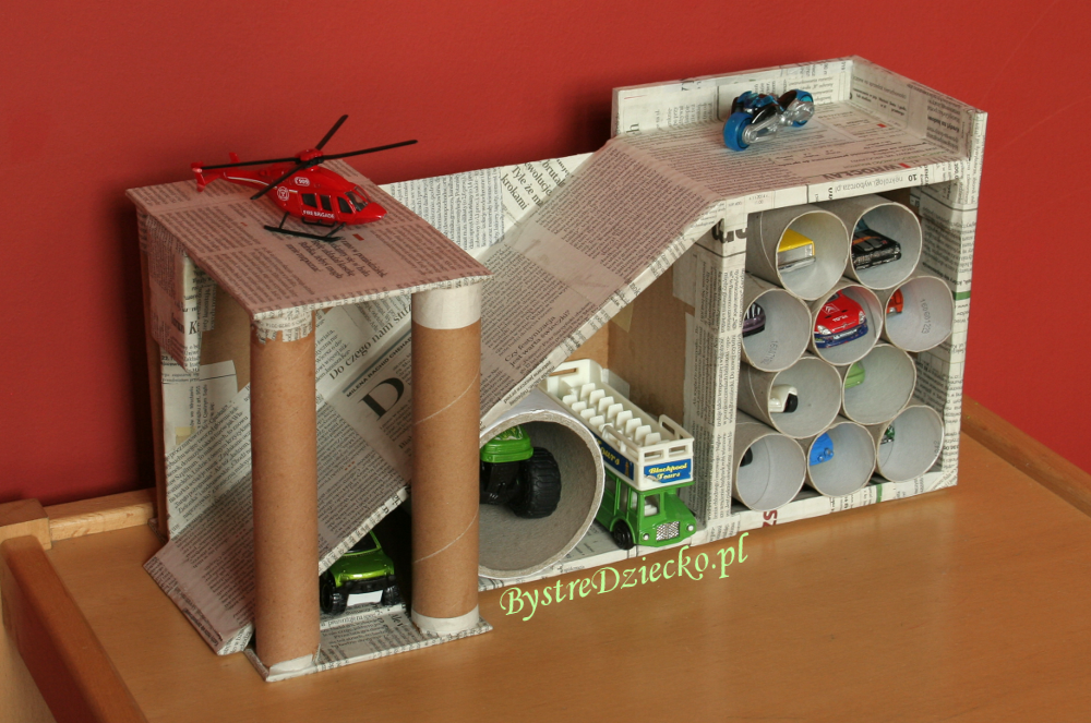 DIY toy garage made from toilet paper rolls and cardboard boxes - toilet paper roll crafts for kids